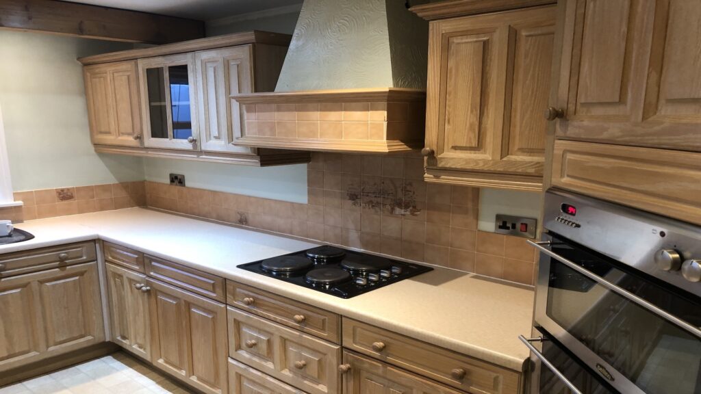 brick canopy double oven light walnut kitchen