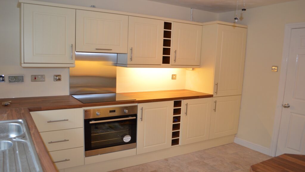down lighting steel splashback-butcher-block worktops new kitchen